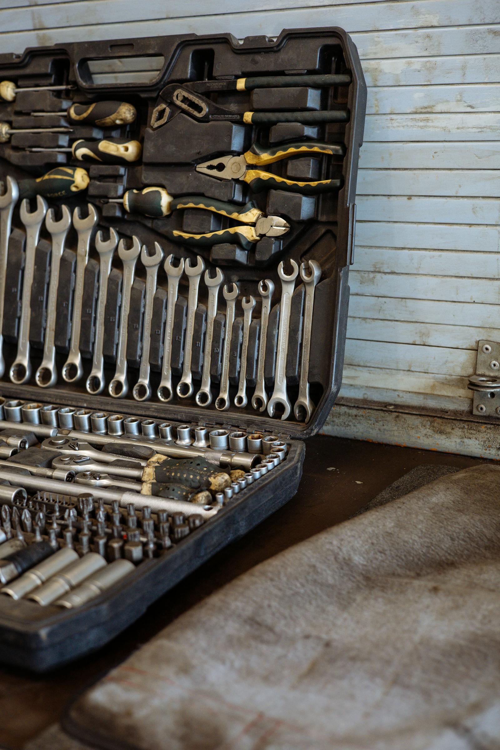 Organized tool kit laid out neatly on a workbench